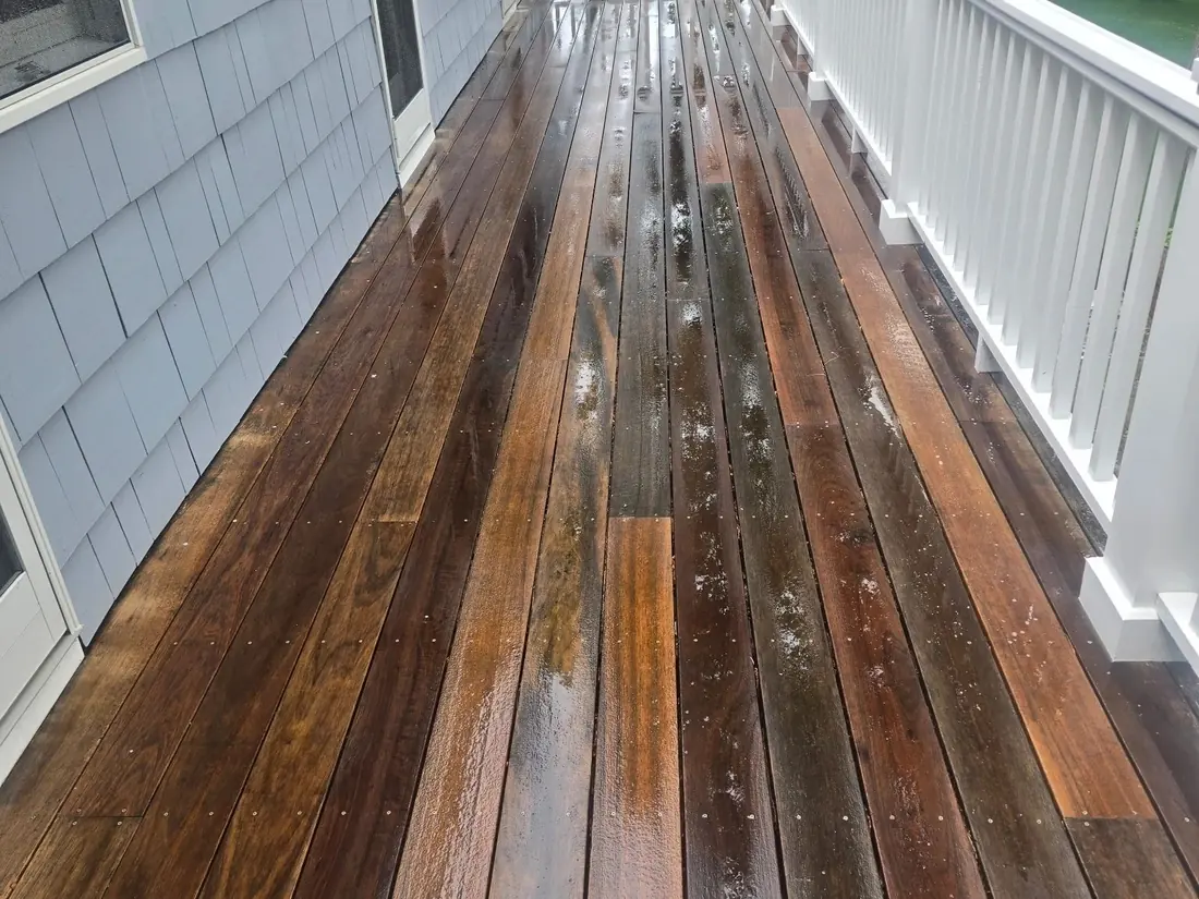 Wooden deck walkway freshly cleaned and restored by Fabian’s