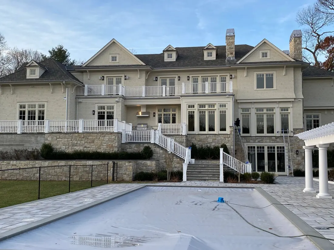 Clean windows and pool terrace at a large home