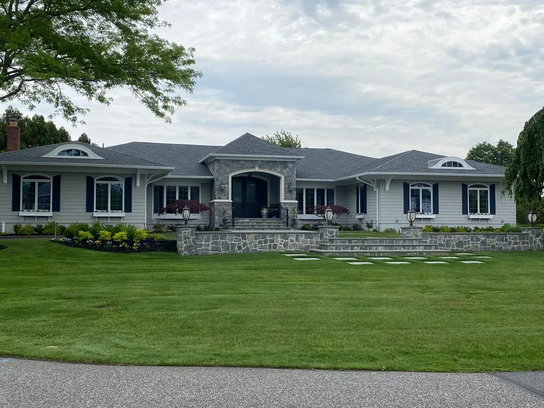 Ranch home with clean windows and stonework