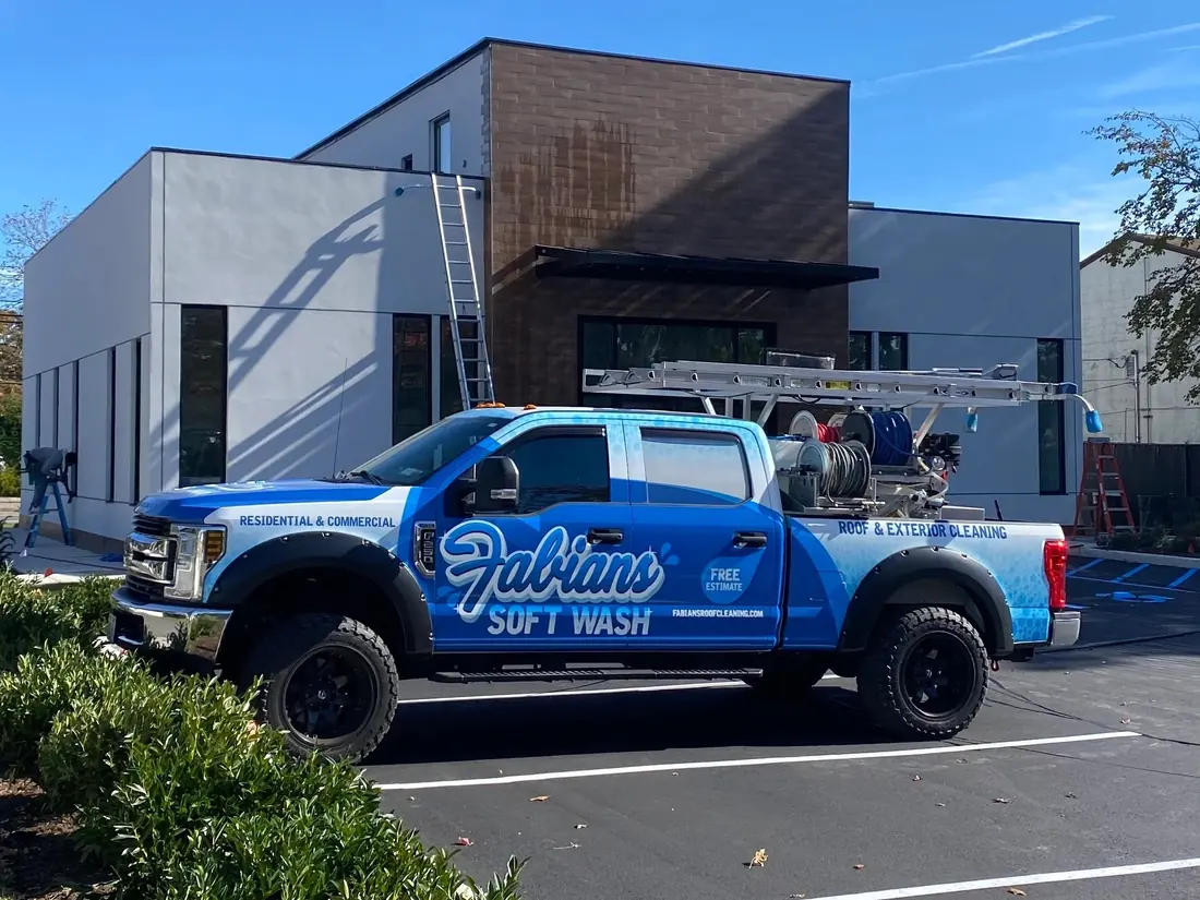 Fabian’s Soft Wash pickup at a modern commercial building